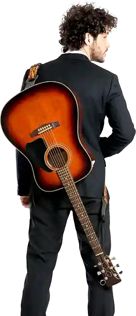 Guitarist with guitar hanging across his back
